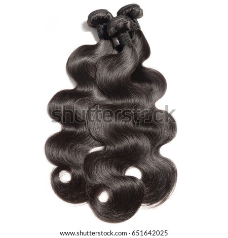 Body wave virgin remy black human hair weave bundles extensions Royalty-Free Stock Photo #651642025