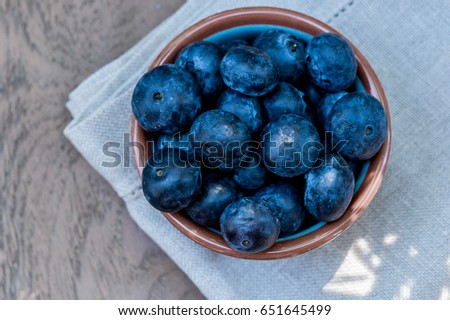 Bowl full of blueberries, healthy eating concept