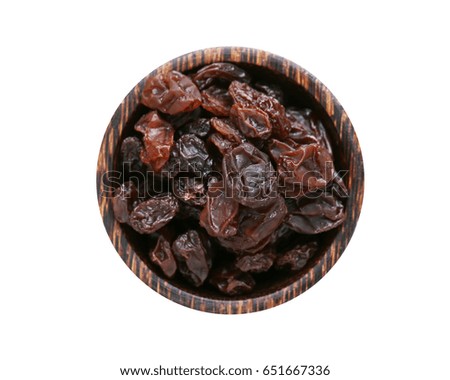 Organic dark raisins isolated on white background.