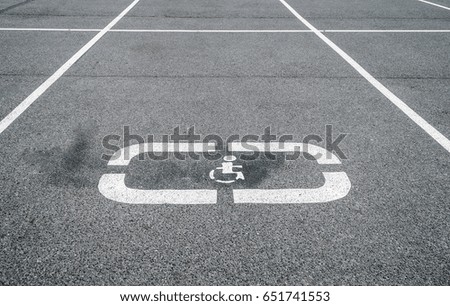 Parking for cars, places for the disabled, sign on the asphalt