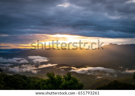 Landscape of Sunrise and foggy over the mountain in morning.