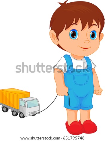 boy playing with toy car