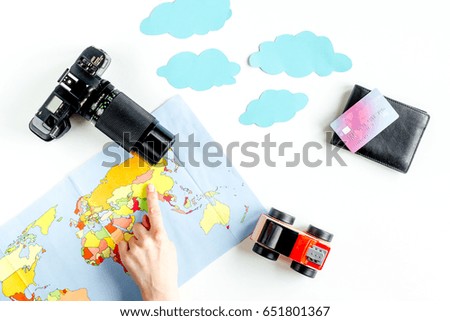 tourist equipment with map and camera for traveling with kids on white background top view mock up