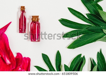 Glass bottle of liquid soap from peonies. Spa resort.