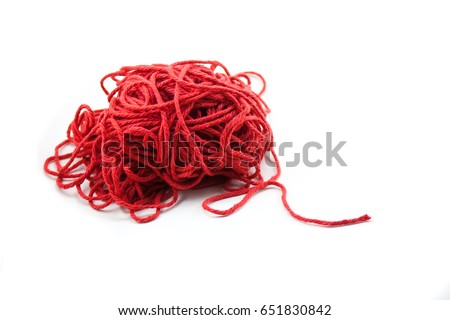 Pile of tangled red yarn with a single end leading out. Isolated on white
 Royalty-Free Stock Photo #651830842