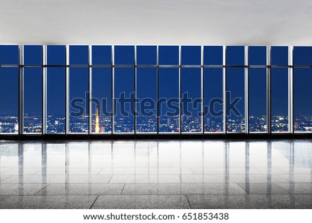 cityscape of modern city from empty office