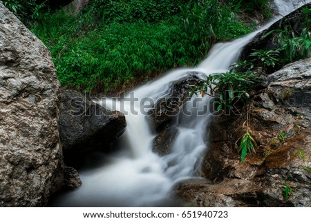 waterfall in rainy season with slow shutter speed