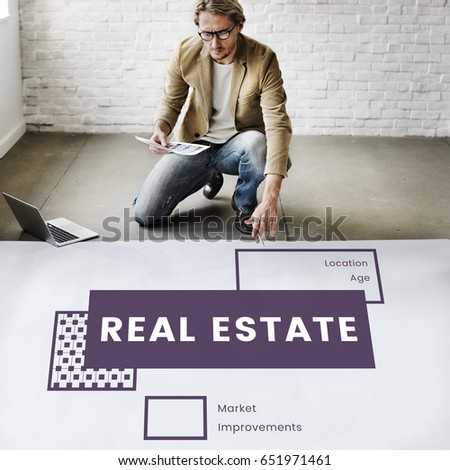 Man working on a banner network graphic overlay on floor
