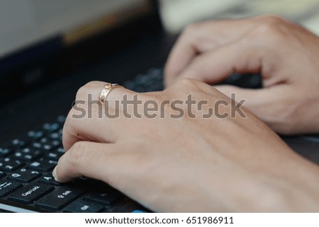 Ring on finger and business concept.