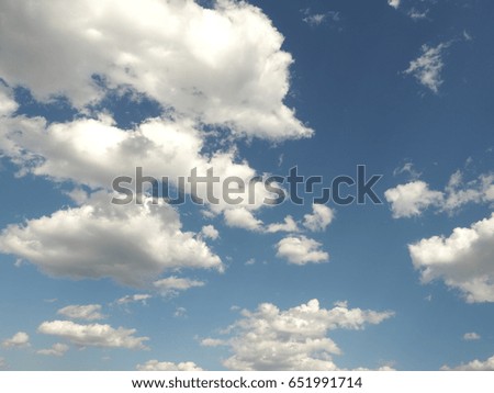 White clouds against blue sky. Nature beautiful background. Deep blue sky and white clouds.