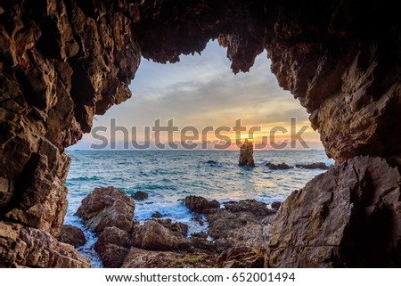 The cave with beautiful sunset view of the sea