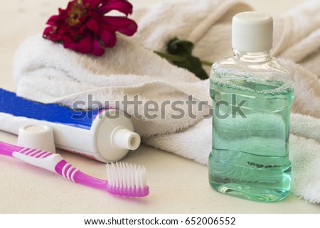 morning with clean in oral cavity and teeth toothbrush mouthwash for healthy teeth on white