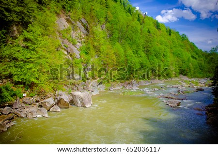 River among rocks Royalty-Free Stock Photo #652036117