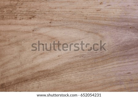 Light grained swirly organic wood background                               