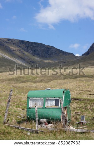 Abandoned old vintage trailer on the West Highland Way - walking in the Scottish highlands, Scotland, UK
