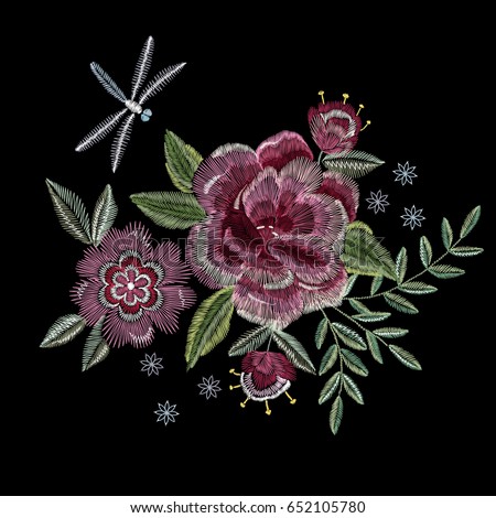 Embroidery colorful ethnic floral design with traditional flowers. Vector needlework with flowers ornament on black background for fashion design.