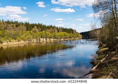 summer landscape of river with clouds and reflections