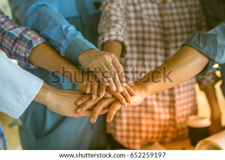 hands of business people. Partner show power promise to trust, respect, reliable and integrity in their work mission. Respect  important join big job. Partnership touch stack hand fist bump for trust