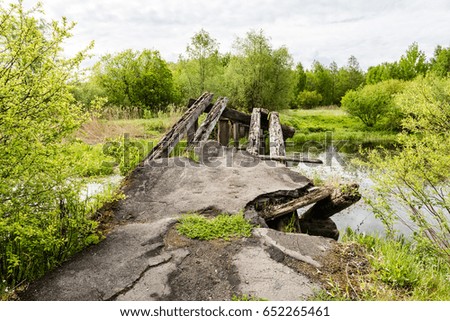 old bridge over the river in countryside of Latvia