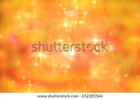 Abstract background with bokeh lights.  Gold bokeh background
