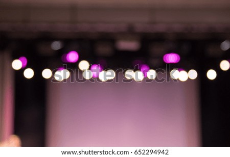 texture blur scene multicolored lights and smoke in concert with silhouettes of people
Background for design, blur texture, actors on stage