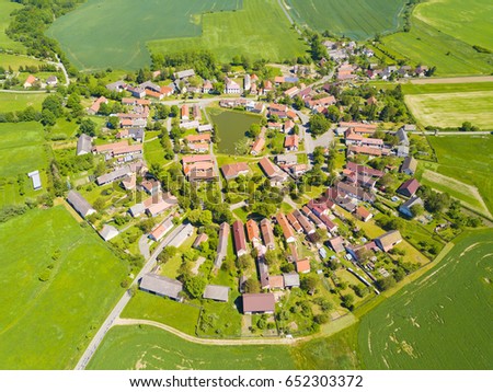 Aerial view of beautiful village in summer countryside. Old village Lipnice in Brdy, Czech republic, Europe. Rundling is a form of circular village. Typical medieval settlement.
