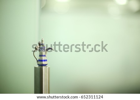 Arabic, arabian coffee jug miniature, silver and blue color with precious stone. united arab emirates