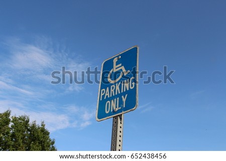 Blue handicap parking sign