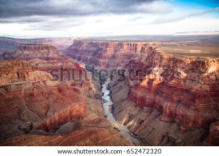 View over the south and north rim part in grand canyon from the helicopter, USA Royalty-Free Stock Photo #652472320