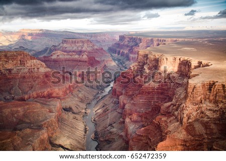 View over the south and north rim part in grand canyon from the helicopter, USA Royalty-Free Stock Photo #652472359