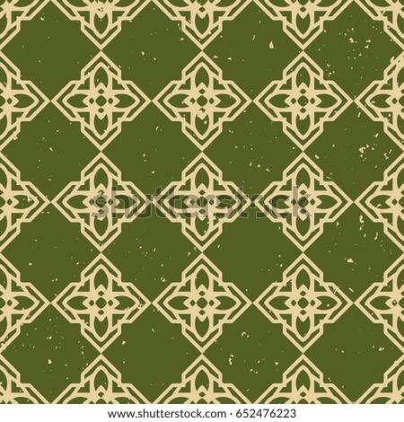 Ornamental grunge vintage textured green background. Scratched old seamless