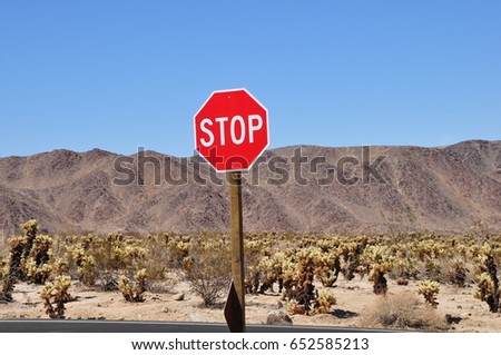 Stop sign in the desert