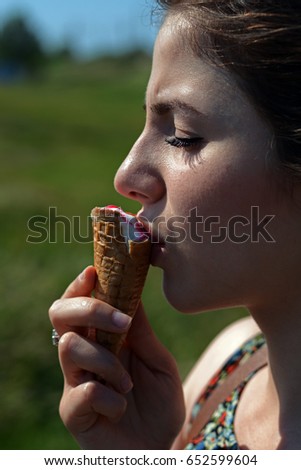 Young girl enjoying ice cream