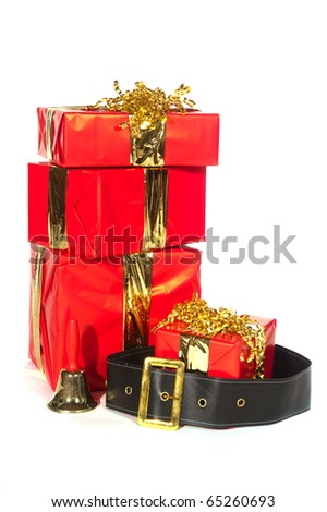Christmas presents in red and gold with cloths from Santa Claus