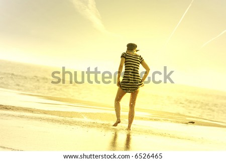 girl in the beach at sunset