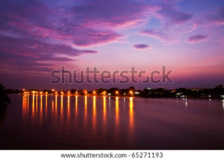 twilight and lighting on river in thailand