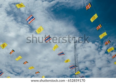 thai flag strings with cloud blue sky	