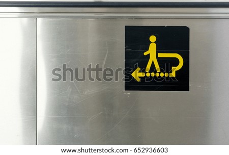sign of the automatic walkway.