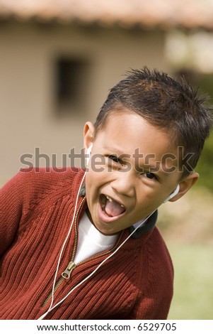 Cute kid listening to music