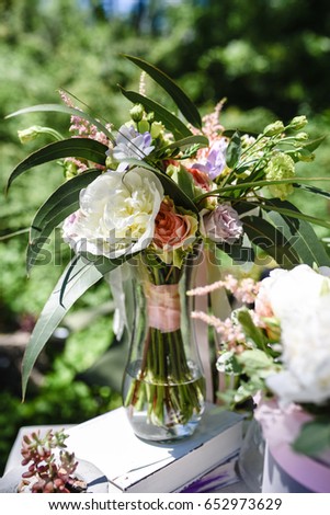 bouquet of delicate roses and eucalyptus close up outdoor