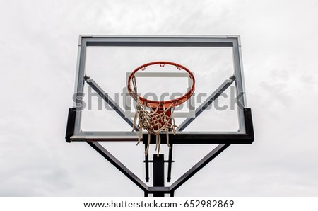 Basketball hoop with sky background close up