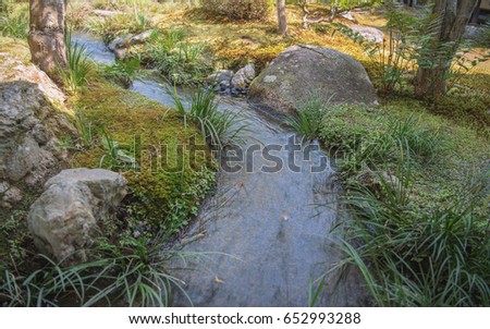 The murmur of stream in the japanese garden