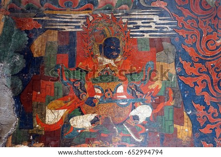 GYANTSE, CHINA - CIRCA MAY 2017 Picture on the wall of Gyantse monastery
