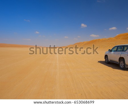 Journey through the Arabian desert by car. A beautiful desert landscape. Oman.