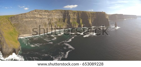 epic birds eye aerial views from the cliffs of moher in county clare ireland. ireland's number 1 tourist attraction. beautiful scenic irish countryside landscape along the wild atlantic way.