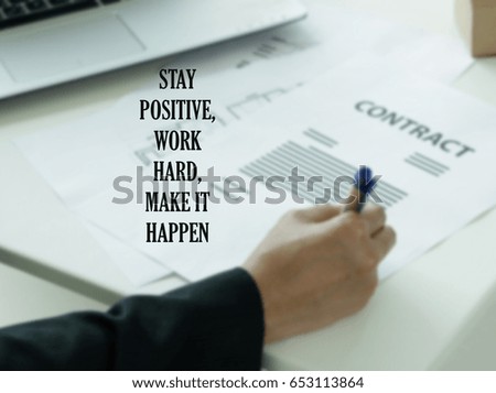 Inspirational quote on blurred work space background