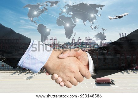 Double Exposure of a businessman handshake  with Map global partner connection of Container Cargo freight ship for Logistic Import Export background (Elements of this image furnished by NASA).