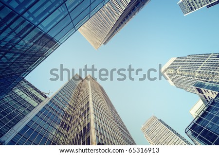 Toned picture of Canary Wharf, financial district in London.