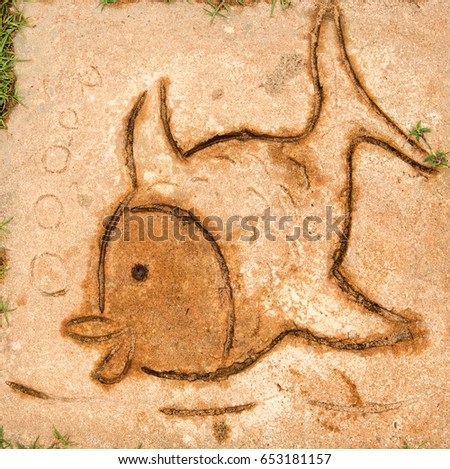 Drawings of animals on a stone tile