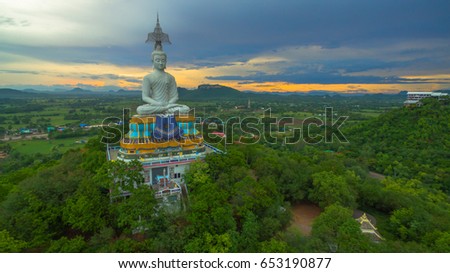 aerial photography at white big Buddha on the mountain on Nong Hoi temple Ratchaburi province